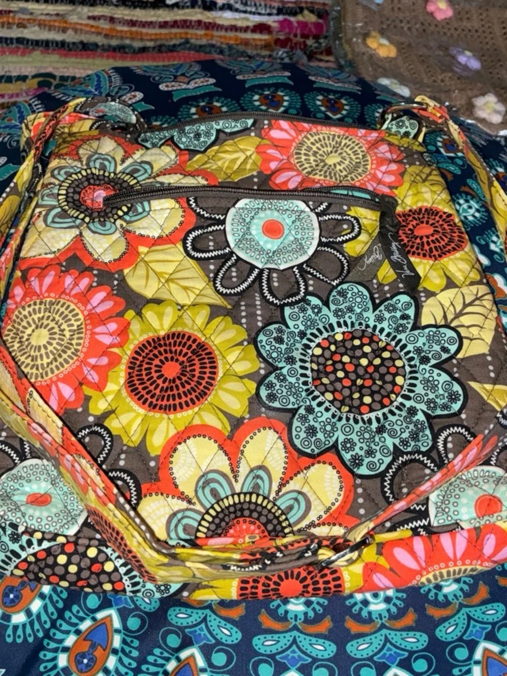 Vera Bradley Quilted Bag with Teal Floral Pattern on Brown
